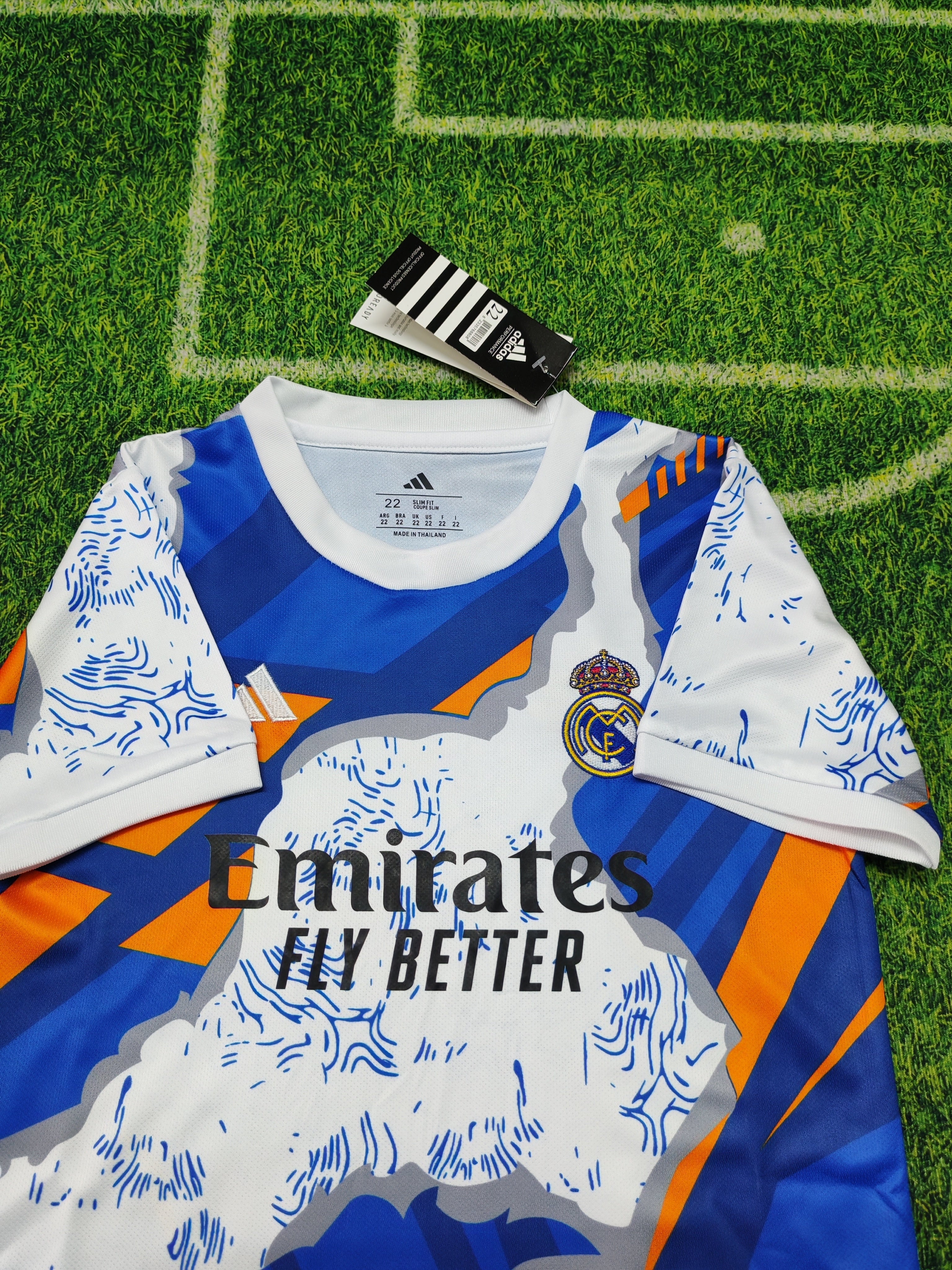 Real Madrid 25/26 Special Edition Kit Kids – Blue Orange Graphic