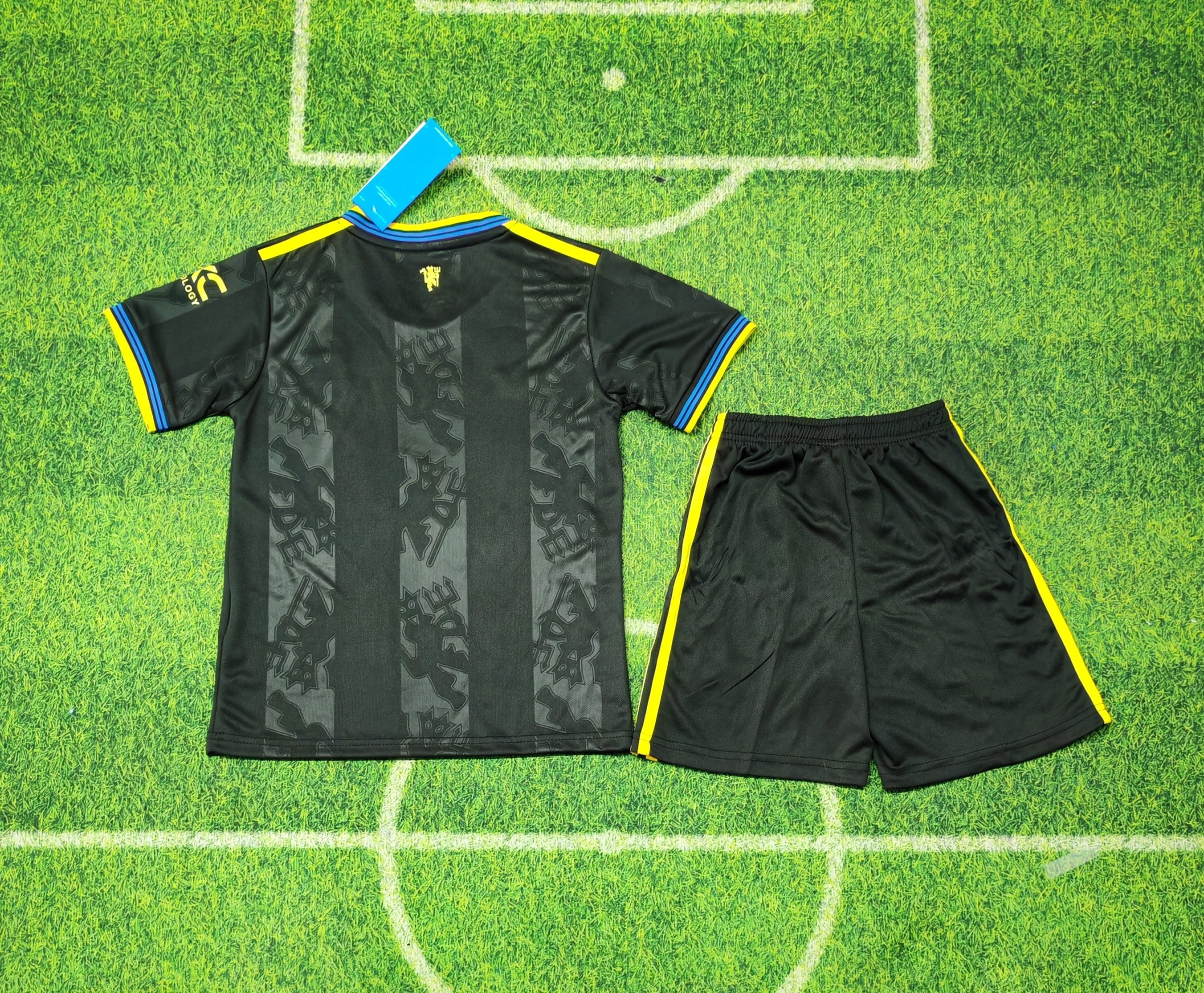 Manchester United Third Kit Kids 2025/26 – Black/Yellow Set