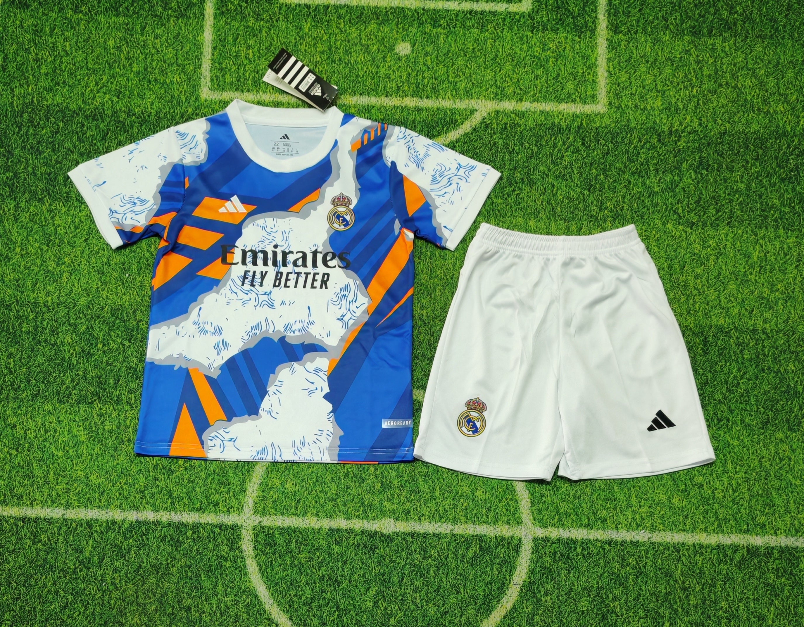 Real Madrid 25/26 Special Edition Kit Kids – Blue Orange Graphic