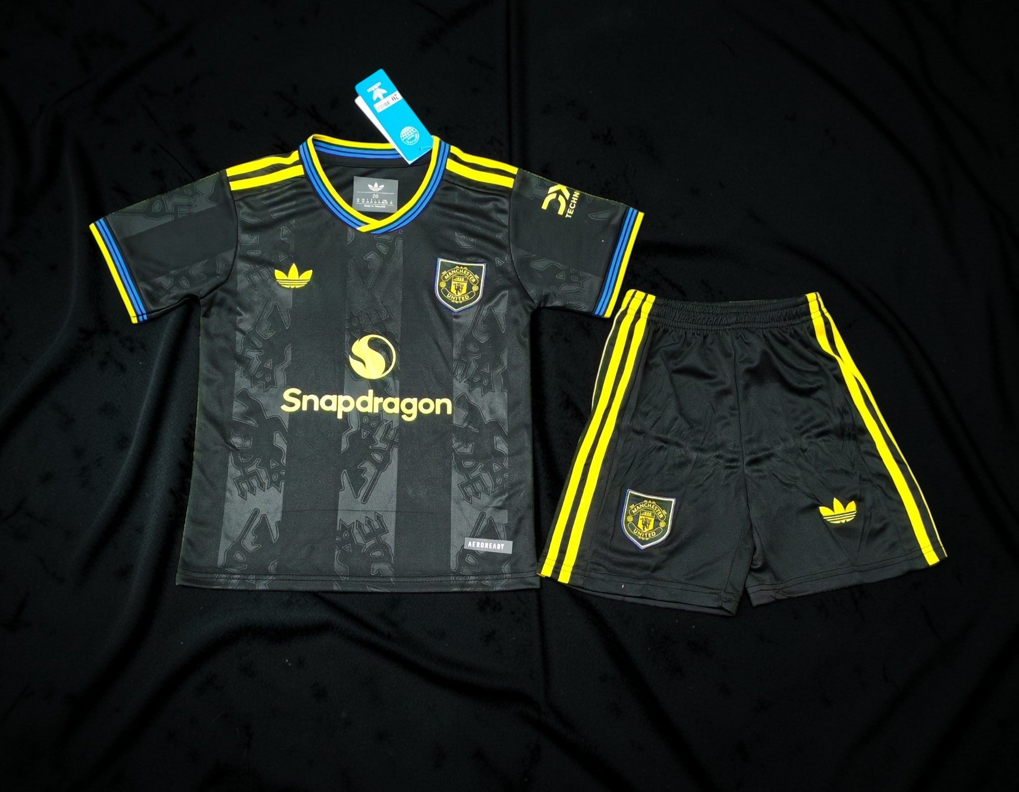 Manchester United Third Kit Kids 2025/26 – Black/Yellow Set